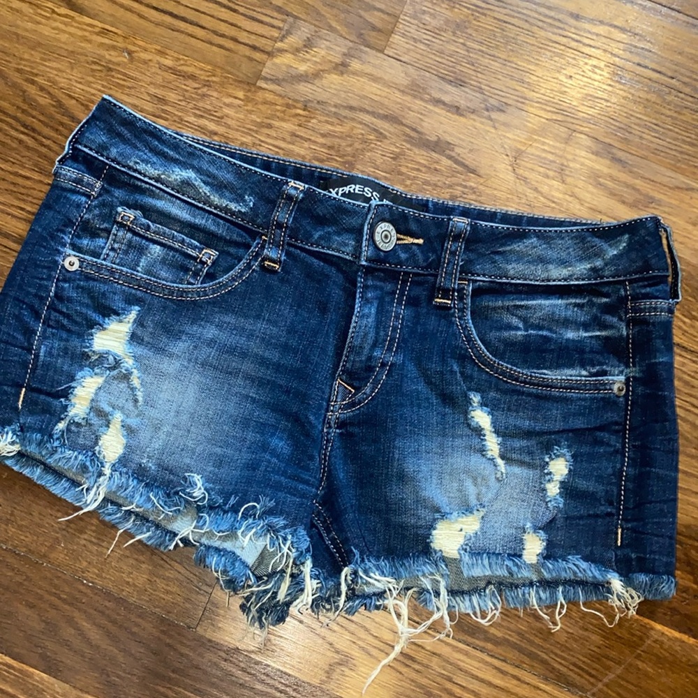 EXPRESS mid rise distressed jean shorts
